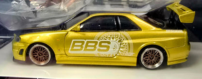 Timemicro Nissan Skyline R34 (gold and black) International Diecast w/diorama character