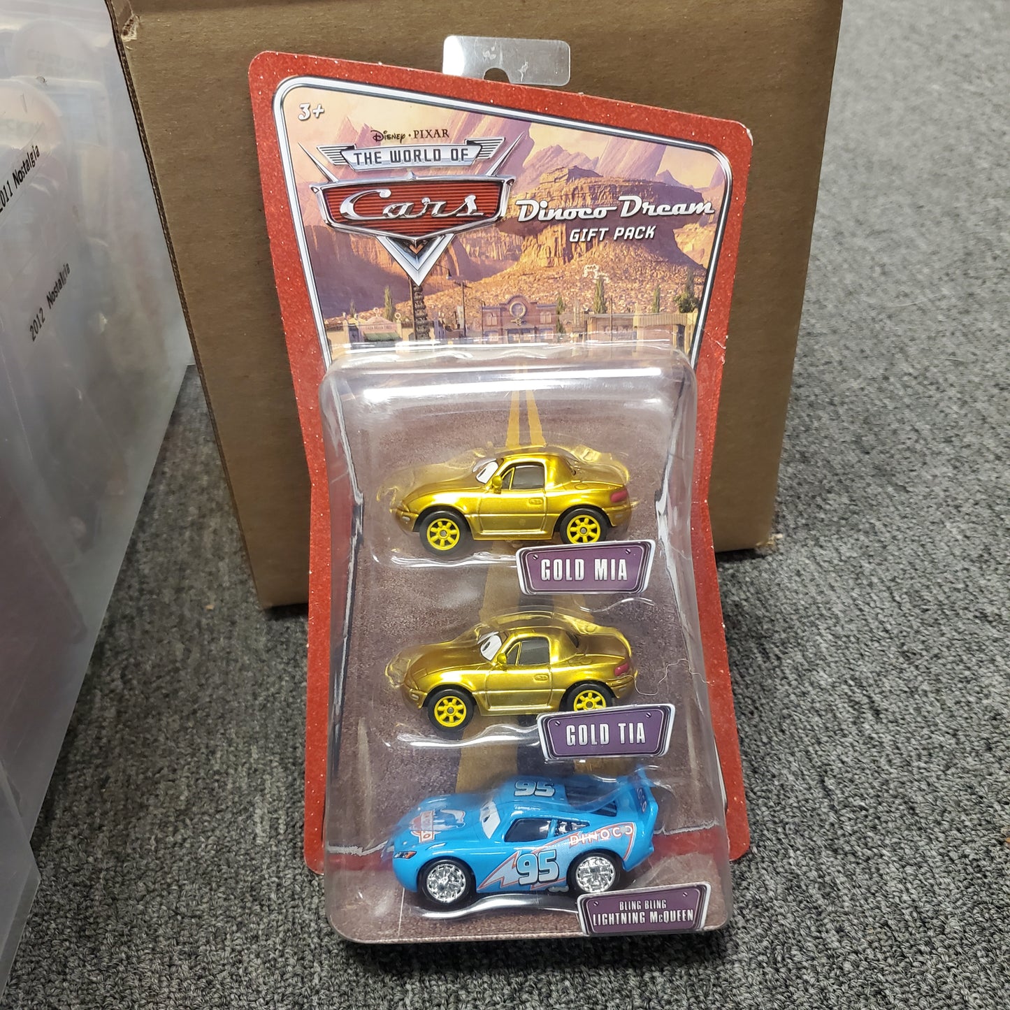 Disney Pixar The World of Cars Dinoco Dream Gift Pack - 4 Pack - Gold Mia, Gold Tia and Bling Bling Lightning McQueen