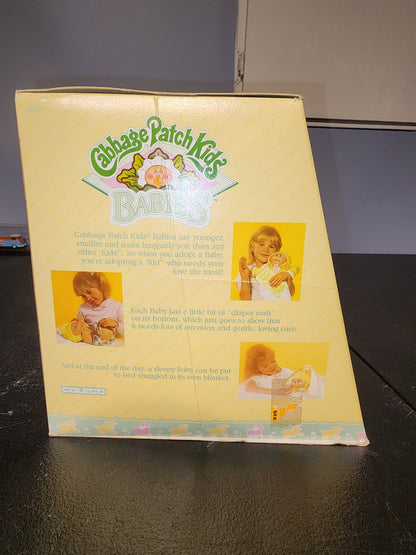 1986 Cabbage Patch Kids Babies doll w/ adoption papers.