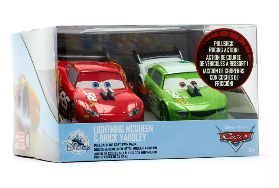 Parques Disney Pixar Cars Rayo McQueen y Brick Yardley Coche extraíble